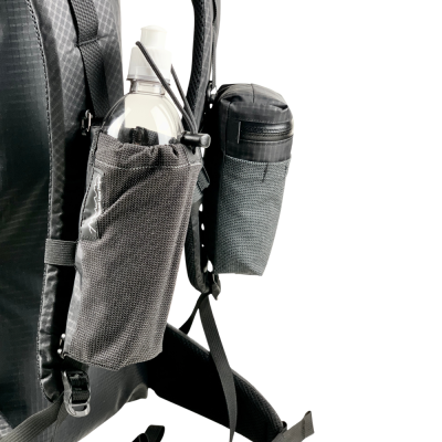 Bottle Pocket and Gear Pocket on Shoulder Straps. Water bottle pocket in foreground.