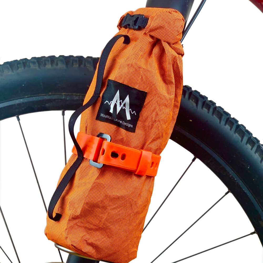 An image showing the Fork Dry Bags on the front forks of a mountain bike