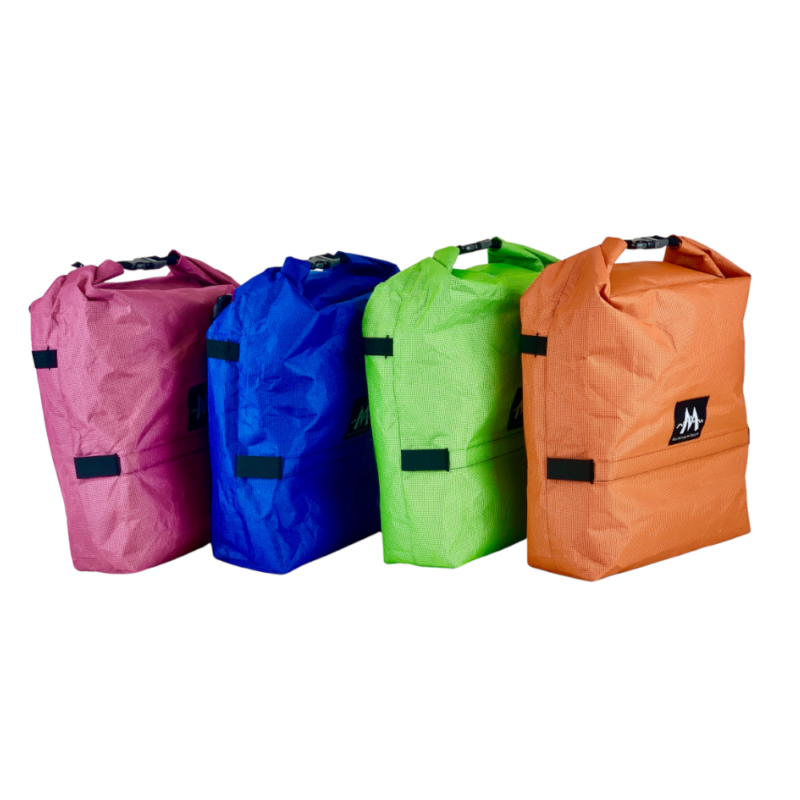 Poco Panniers in 2026 Colors: Fuchsia Raspberry, Electric Blue, Lime, and Rust Orange