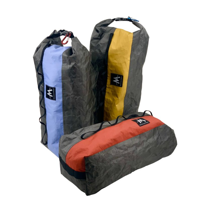 New Striped Dry Bags: Left Blue Stripe, Right Yelllow Stripe, and foreground Red Stripe