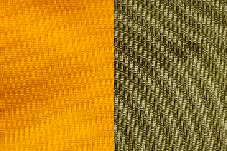 MLD Pro Sil Polyester Fabric. Image shows Orange Citrus color on the left and Olive Drab Green on the right.