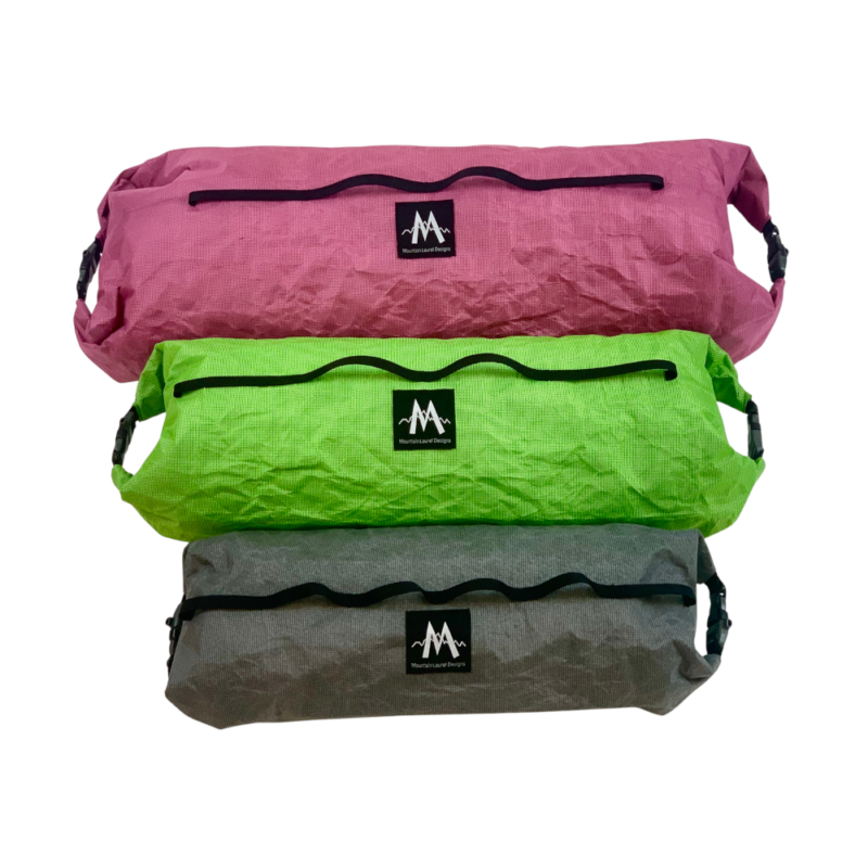 A large Fuchsia Raspberry, a medium Lime, and a Small Gray Double Ended Dry Bag