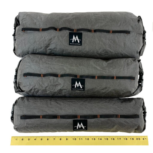 Image shows Ultra X Double End Handlebar Dry Bags stacked on top of each other to show size difference between Small, Medium, and Large.