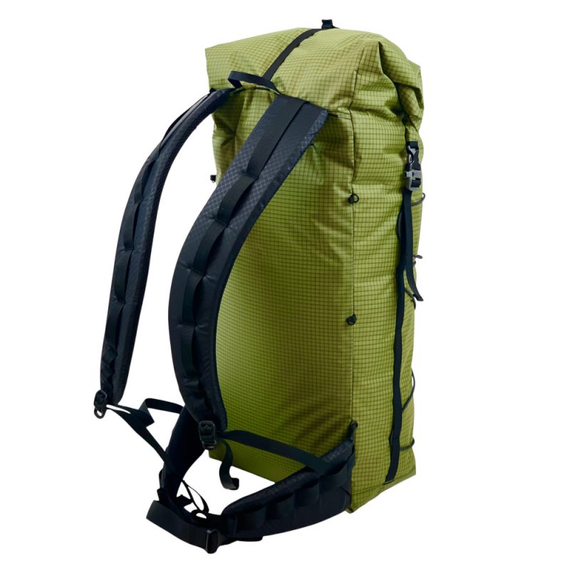 A 3/4 back view of the Super Core 38L backpack in Avocado Green Ultra Grid